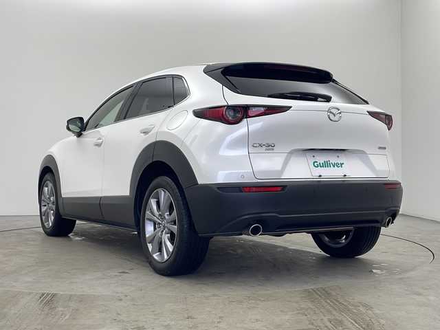 マツダ ＣＸ－３０ XD プロアクティブ 秋田県 2023(令5)年 2万km スノーフレイクホワイトパールマイカ 4WD/純正ナビ/(フルセグTV//DVD/AppleCarPlay/AndroidAuto)/バックカメラ/ヘッドアップディスプレイ/電動リアゲート/i-ActiveSense/レーダークルーズコントロール/レーンキープアシスト/横滑防止機能/衝突被害軽減システム/AT誤発進抑制制御/アイドリングストップ/プッシュスタート/スマートキー/スペアキー/革巻ステアリング/ステアリングリモコン/パドルシフト/オートライト/LEDヘッドライト/オートマチックハイビーム/電動格納ミラー/ブラインドスポットミラー/ETC/前方ドライブレコーダー/前後コーナーセンサー/社外フロアマット/純正アルミホイール/取扱説明書/保証書