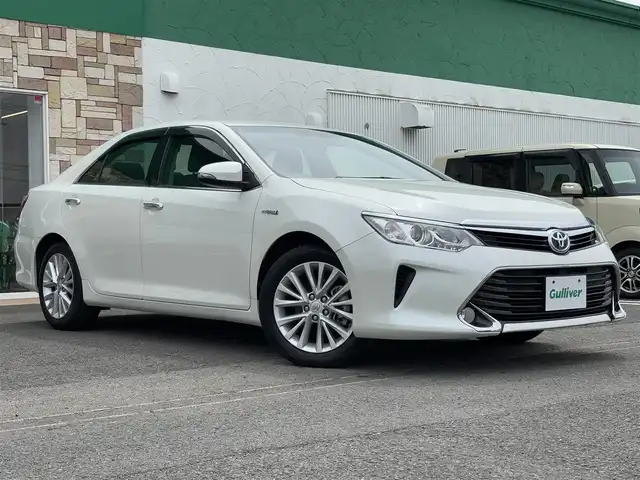 トヨタ カムリ ハイブリット Gパッケージ 徳島県 2016(平28)年 2万km ホワイトパールクリスタルシャイン ナビ　8インチ　NSCP-W64/AM/FM/TV/Bluetooth/DISC/SD/ETC/クルーズコントロール/純正アルミホイール/スマートキー/プッシュスタート/フォグライト/ドアバイザー/車両接近通報装置/純正フロアマット