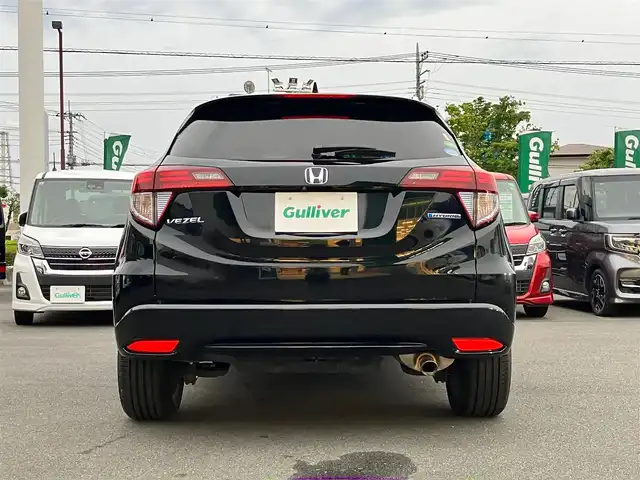 ホンダ ヴェゼル ハイブリッド Z 静岡県 2015(平27)年 3.9万km クリスタルブラックパール エンジンスタートボタン/スマートキー/アイドリングストップ/取扱説明書/パワーステアリング/パワーウィンドウ/MTモード付きAT/寒冷地仕様/オートエアコン/クルーズコントロール/ETC/SDナビ（CD.DVD.BT）/バックカメラ/純正フロアマット/純正アルミホイール/ルーフレール/ハーフレザー/D席N席シートヒーター/ABS/横滑り防止装置/オートライト/W+サイドエアバック/衝突軽減システム/カーテンエアバック