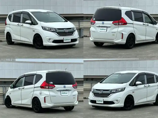 ホンダ フリード ハイブリット EX 静岡県 2019(令1)年 6.9万km ホワイトオーキッドパール 6人乗り/純正9インチナビ/・フルセグ/CD/DVD/Bluetooth/バックカメラ/ビルトインETC2.0/両側パワースライドドア/クルーズコントロール追従有/ハーフレザーシート/革巻きステアリング/スマートキー/・プッシュスタート/LEDヘッドライト/・フォグランプ/ドアバイザー/社外16インチアルミホイール/純正フロアマット