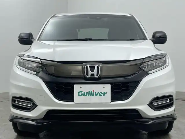 ホンダ ヴェゼル ハイブリッド RS ホンダセンシング 岡山県 2019(平31)年 6.8万km プラチナホワイトパール 純正８インチメモリナビ/【Bluetooth/フルセグTV/Carplay/HDMI】/衝突軽減ブレーキシステム/追従型クルーズコントロール/ビルトインＥＴＣ/ＬＥＤヘッドライト/バックカメラ/前席シートヒーター/純正ドライブレコーダー（前）/オートブレーキホールド/パドルシフト/ISOFIX/ステアリングスイッチ/チルトステアリング/シートリフター/ウインカーミラー/ドアバイザー/新車保証書/取扱説明書/スマートキー×2