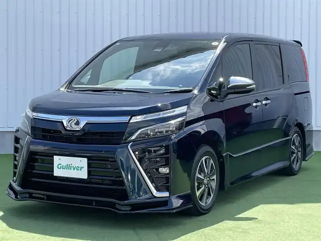 トヨタ ヴォクシー ZS 煌Ⅱ 香川県 2019(平31)年 4.1万km ブラッキッシュアゲハガラスフレーク 登録時走行距離：40506km/純正ナビゲーション/→フルセグTV/→CD/DVD再生/バックカメラ/フリップダウンモニター/ETC2.0 /ドライブレコーダー/両側パワースライドドア/LEDオートライト/フォグランプ/オートハイビーム/前後コーナーセンサー/純正16インチアルミホイール/スマートキー