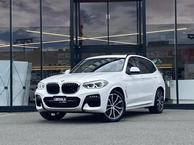 ＢＭＷ ＢＭＷ Ｘ３ xDrive20d Mスポーツ 福岡県 2020(令2)年 2.6万km 白 ・1オーナー/・サンルーフ/・アクティブクルーズコントロール/・純正メモリーナビ/USB/Bluetooth/AppleCarPlay/・全方位カメラ/・茶革シート/シートヒーター/・前後ドライブレコーダー/・フルセグ/・ETC/・純正20AW/・プッシュスタート/・パーキングアシスト/・アイドリングストップ/・スマートキー/・スペアキー/・電動リアゲート/・フルフラットシート/・パワーシート/・レーンキープアシスト/・オートライト/・LEDライト/・ワイヤレス充電