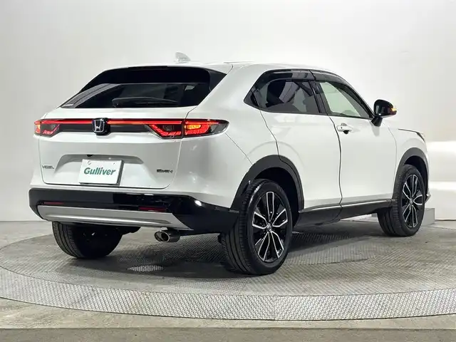 ホンダ ヴェゼル ハイブリッド e:HEV Z 大阪府 2021(令3)年 2.7万km プラチナホワイトパール ホンダセンシング 純正9incナビTV Bカメラ ETC ハーフレザー シート＆ハンドルヒーター 電動リアゲート 衝突軽減 レーダーC クリアランスソナー BSM ダウンヒルアシスト 前後ドラレコ
