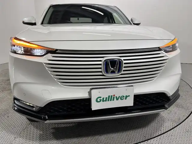 ホンダ ヴェゼル ハイブリッド e:HEV Z 大阪府 2021(令3)年 2.7万km プラチナホワイトパール ホンダセンシング 純正9incナビTV Bカメラ ETC ハーフレザー シート＆ハンドルヒーター 電動リアゲート 衝突軽減 レーダーC クリアランスソナー BSM ダウンヒルアシスト 前後ドラレコ