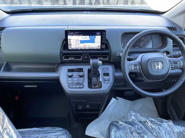 ホンダ フリード ハイブリット e:HEV クロスター 山口県 2025(令7)年 0.1千km ＬグリーンＭ 登録済未使用車/純正9インチナビ/・フルセグテレビ/・applecarplay/・androidauto/・Bluetooth接続/・AM/FM/バックカメラ/Honda SENSING/・衝突軽減ブレーキ/・踏み間違い衝突軽減システム/・急アクセル抑制機能/・路外逸脱抑制機能/・歩行者事故低減ステアリング/・渋滞追従機能付アダプティブクルーズコントロール/・車線維持支援システム/・トラフィックジャムアシスト/・先行車発進お知らせ機能/・オートマチックハイビーム/・標識認識機能/両側パワースライドドア/USB入力端子/ハーフレザーシート/シートヒーター/ウォークスルー/スマートキー/プッシュスタート/スペアキー1本/電子パーキング/純正LEDライト/純正15インチアルミホイール/ウィンカーミラー/取り扱い説明書/保証書