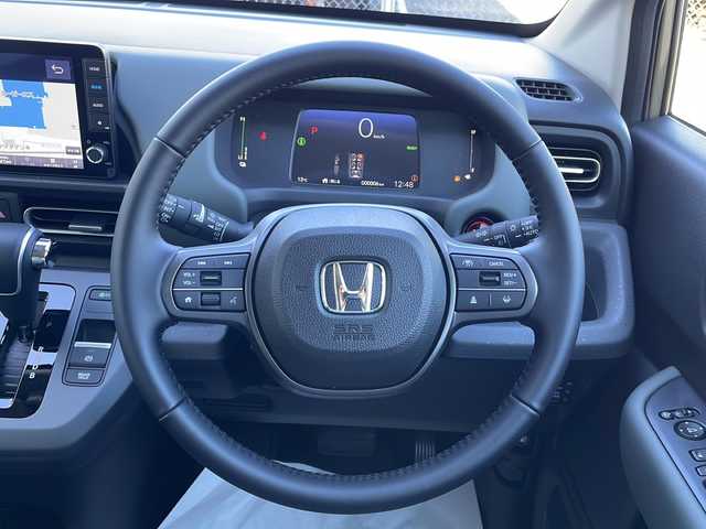 ホンダ フリード ハイブリット e:HEV クロスター 山口県 2025(令7)年 0.1千km ＬグリーンＭ 登録済未使用車/純正9インチナビ/・フルセグテレビ/・applecarplay/・androidauto/・Bluetooth接続/・AM/FM/バックカメラ/Honda SENSING/・衝突軽減ブレーキ/・踏み間違い衝突軽減システム/・急アクセル抑制機能/・路外逸脱抑制機能/・歩行者事故低減ステアリング/・渋滞追従機能付アダプティブクルーズコントロール/・車線維持支援システム/・トラフィックジャムアシスト/・先行車発進お知らせ機能/・オートマチックハイビーム/・標識認識機能/両側パワースライドドア/USB入力端子/ハーフレザーシート/シートヒーター/ウォークスルー/スマートキー/プッシュスタート/スペアキー1本/電子パーキング/純正LEDライト/純正15インチアルミホイール/ウィンカーミラー/取り扱い説明書/保証書