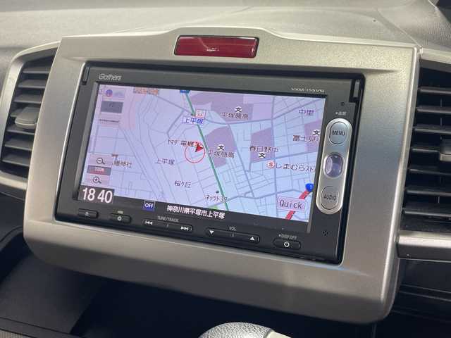 ホンダ フリード ハイブリット ジャストセレクション 神奈川県 2014(平26)年 7.3万km プレミアムスパークルブラックパール 純正7インチSDナビ(VXM-155VSi)/ドライブレコーダー/衝突被害軽減システム/車線逸脱警報/バックカメラ/クルーズコントロール/両側パワースライドドア/横滑り防止装置/ETC/アイドリングストップ/オートライト/サイドスポイラー/ステアリングスイッチ /ブラックレザー調シートカバー(前席/2nd)/ISOFIX対応/ウィンカーミラー/電動格納ミラー/シートリフター/ドアバイザー/プッシュスタート/スマートキー/フロアマット/スペアキー/取扱説明書