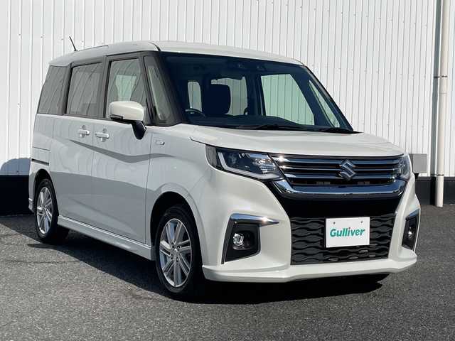 スズキ ソリオ HV MZ 千葉県 2022(令4)年 1.7万km リーフホワイト 衝突被害軽減システム/車線逸脱警報/クルーズコントロール/両側パワースライドドア/横滑り防止装置/アイドリングストップ/LEDヘッドライト/フォグランプ/オートライト/ウィンカーミラー/電動格納ミラー/純正15インチAW/シートリフター/プッシュスタート/スマートキー/スペアキー/取扱説明書/保証書