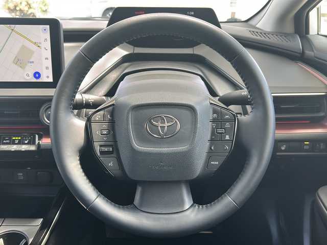 トヨタ プリウス Z 愛知県 2024(令6)年 0.7万km プラチナホワイトパールマイカ 禁煙車/ワンオーナー/革シート/純正メーカーナビ/Miracast/フルセグ/パノラミックビューモニター/デジタルインナーミラー/　（ドライブレコーダー内蔵）/純正ビルトインETC/電動リアゲート/トヨタセーフティセンス/アドバンストパーク/ステアリングリモコン/前後コーナーセンサー/クリアランスソナー/アダプティプクルーズコントロール/ブラインドスポットモニター/置くだけ充電/ハンドルヒーター/シートヒーター（D/N席）/エアーシート（D/N席）/パワーシート（D席）/メモリーシート（D席）/D/Nサンシェード/純正19アルミ/純正フロアマット/フォグランプ/純正LEDヘッドライト/AUTOライト/AUTOハイビーム/100V充電/電動格納ミラー/スペアキー/取説/保証書