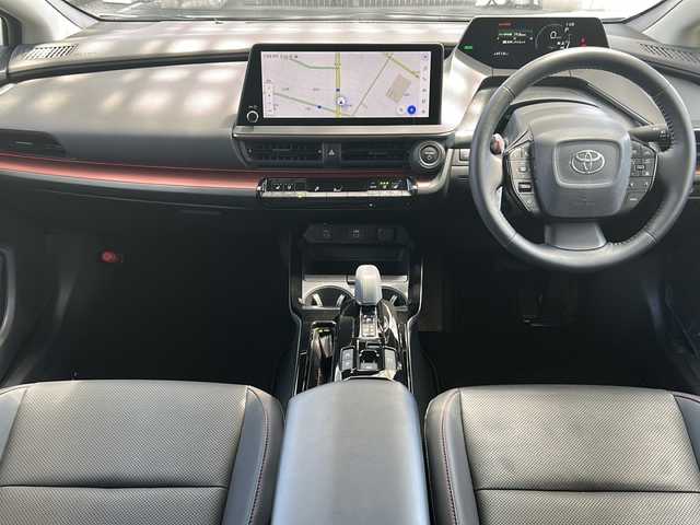 トヨタ プリウス Z 愛知県 2024(令6)年 0.7万km プラチナホワイトパールマイカ 禁煙車/ワンオーナー/革シート/純正メーカーナビ/Miracast/フルセグ/パノラミックビューモニター/デジタルインナーミラー/　（ドライブレコーダー内蔵）/純正ビルトインETC/電動リアゲート/トヨタセーフティセンス/アドバンストパーク/ステアリングリモコン/前後コーナーセンサー/クリアランスソナー/アダプティプクルーズコントロール/ブラインドスポットモニター/置くだけ充電/ハンドルヒーター/シートヒーター（D/N席）/エアーシート（D/N席）/パワーシート（D席）/メモリーシート（D席）/D/Nサンシェード/純正19アルミ/純正フロアマット/フォグランプ/純正LEDヘッドライト/AUTOライト/AUTOハイビーム/100V充電/電動格納ミラー/スペアキー/取説/保証書