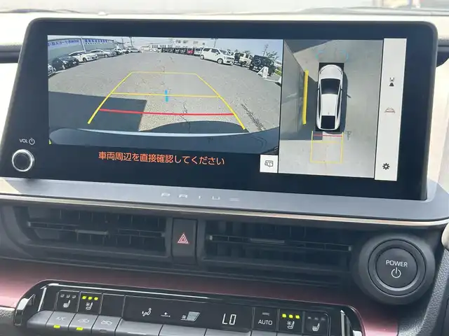 トヨタ プリウス Z 福島県 2024(令6)年 0.7万km プラチナホワイトパールマイカ ワンオーナー/寒冷地仕様/純正12.3インチディスプレイオーディオ/【Miracast/BT/フルセグTV/USB/AM/FM】/パノラミックビューモニター/デジタルインナーミラー(ドライブレコーダー内蔵)/純正ビルトインETC2.0/トヨタセーフティセンス/・ブラインドスポットモニター（BSM）/・安全降車アシスト（SEA）＋ドアオープン制御（e-latch）/・パーキングサポートブレーキ（前後方・静止物・車両）/・アドバンスト パーク（高度自動駐車）/・プリクラッシュセーフティ（PCS）/・レーントレーシングアシスト（LTA）/・レーンディパーチャーアラート（LDA）/・レーダークルーズコントロール（全車速追従機能付）/・プロアクティブドライビングアシスト（PDA）/・ロードサインアシスト（RSA）/LEDヘッドライト(AUTO付)/オートマチックハイビーム（AHB）/前席シートヒーター/前席エアシート/ステアリングヒーター/パワーシート/パワーバックドア/純正フロアマット/純正アルミホイール装着/置くだけ充電/USB入力端子＋タイプC/AC100V電源/スペアキー(1本)/保証書・取説