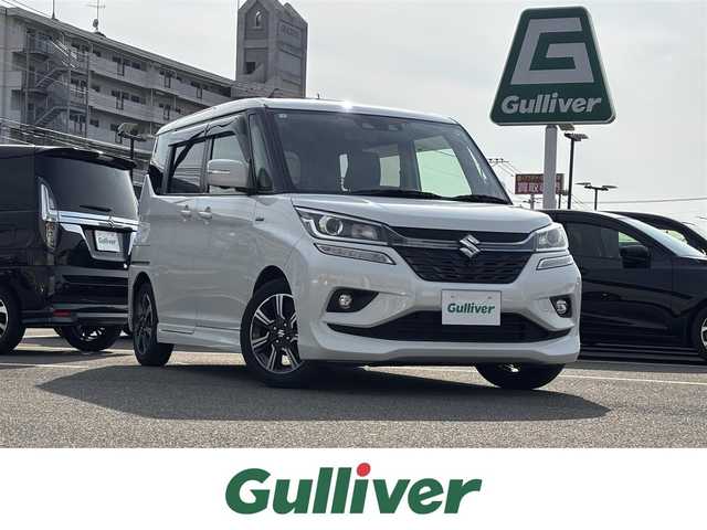 スズキ ソリオ バンディット HV SV 大分県 2020(令2)年 6.1万km ピュアホワイトP ・純正SDナビ(CD.DVD.SD.BT.USB)/・全方位カメラ/・フルセグテレビ/・テレビキャンセラー/・ALPINEフリップダウンモニター/・デュアルカメラブレーキサポート/・リアセンサー/・片側パワースライドドア/・レーダークルーズコントロール/・ETC/・ドライブレコーダー/・ステアリングリモコン/・パドルシフト/・スマートキー/・スペアキー