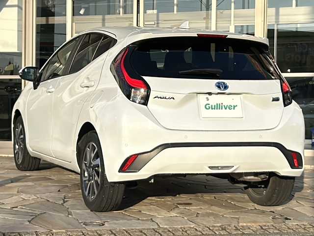 トヨタ アクア Z 静岡県 2021(令3)年 5.1万km プラチナホワイトパールマイカ 純正ディスプレイオーディオ/・CD/・DVD/・Bluetooth/・AM/・FM/主要装備/・トヨタセーフティーセンス/・追従クルコン/・レーンキープ/・衝突軽減ブレーキ/・クリアランスソナー/・パーキングサポート/・D+N席シートヒーター/・ハンドルヒーター/・100V充電/・ETC/・前方ドラレコ/・ステアリングスイッチ/・オートライト