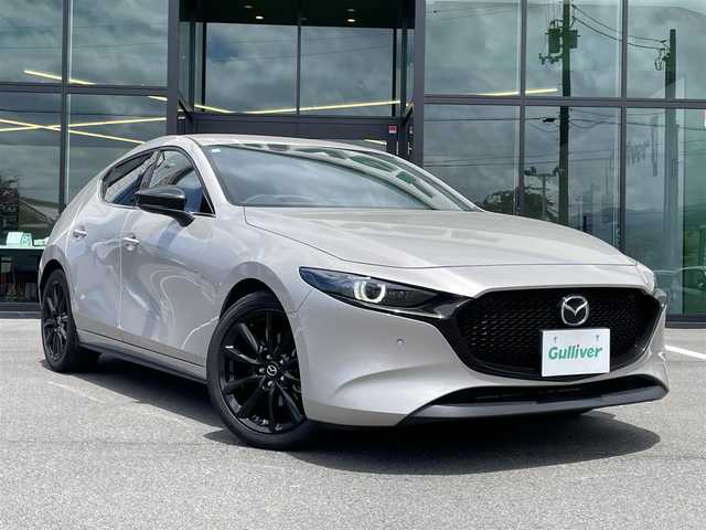 マツダ マツダ３ファストバック 20S レトロスポーツED 愛媛県 2023(令5)年 1.9万km プラチナクォーツメタリック BOSEスピーカー/専用レガーヌ革シート/アラウンドビューモニター/MOPナビ/Bluetooth/フルセグTV/スマホ連携/HDMI/ETC/パワーシート/メモリシート/前席シートヒーター/ステアリングヒーター/革巻きステアリング/ステアリングリモコン/レーダークルーズコントロール/レーンキープアシストシステム/リヤクロストラフィックアラート/前後コーナーセンサー/LEDヘッドライト/オートライト/オートマチックハイビーム/フォグランプ/置くだけ充電/純正18インチアルミホイール/純正フロアマット/スマートキー/プッシュスタート