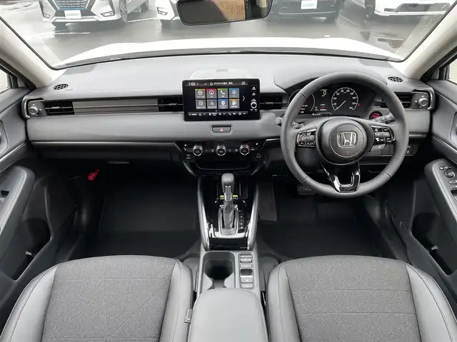 ホンダ ヴェゼル ハイブリッド e:HEV Z 東京都 2025(令7)年 0.1千km プラチナホワイトパール 登録済未使用車　/純正ナビ　/置型充電　/BSM　/ETC2.0　/レーダークルーズコントロール　/18インチ純正ホイール　/純正LED　/電動リアケート　/シートヒーター　/衝突被害軽減ブレーキ　/盗難防止装置