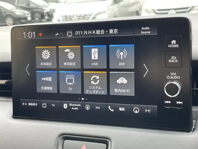 ホンダ ヴェゼル ハイブリッド e:HEV Z 東京都 2025(令7)年 0.1千km プラチナホワイトパール 登録済未使用車　/純正ナビ　/置型充電　/BSM　/ETC2.0　/レーダークルーズコントロール　/18インチ純正ホイール　/純正LED　/電動リアケート　/シートヒーター　/衝突被害軽減ブレーキ　/盗難防止装置