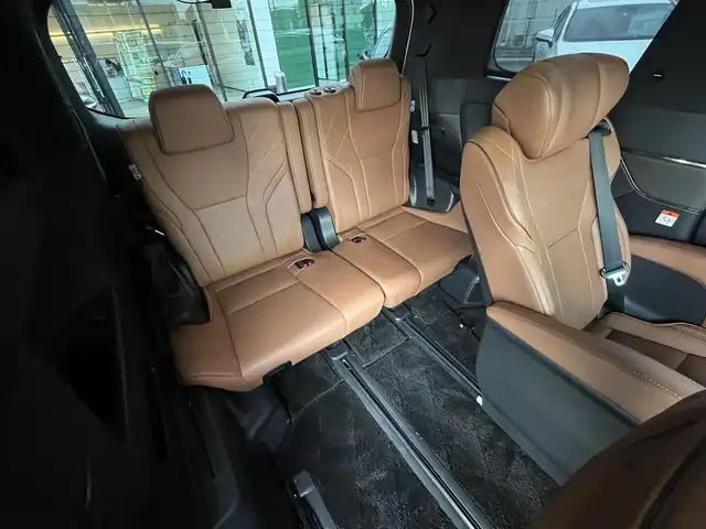 トヨタ ヴェルファイア ハイブリット Z プレミア 愛媛県 2023(令5)年 0.9万km プラチナホワイトパールマイカ 登録時走行距離：9038Km/メーカーオプション純正14インチHDナビ/AM/FM/フルセグTV/Bluetooth/ビルトインＥＴＣ2.0/後席モニター/全周囲カメラ/前後ドライブレコーダー/両側パワスラ/電動リアゲート/ワイヤレス充電/パドルシフト/追従クルコン/革シート/デジタルミラー/横滑り防止装置/パーキングアシスト/LEDヘッドライト/オートライト/オートハイビーム/フォグランプ/エンジンスタートボタン/スマートキー/純正アルミホイール/純正フロアマット/シートーヒーター/エアシート/シートメモリ