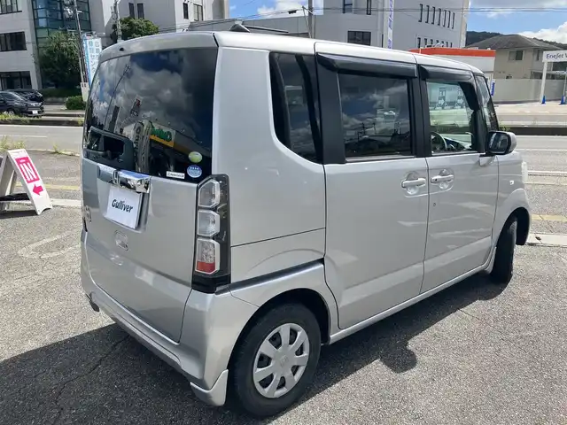 ホンダ Ｎ ＢＯＸ G Lパッケージ 広島県 2012(平24)年 4.1万km アラバスターシルバーメタリック 純正ディラーナビ（VXM-128VSX）/バックカメラ/ワンセグ/CD/DVD/AM/FM/純正フリップダウンモニター/左側パワースライドドア/シートカバー/スマートキー/スペアキー