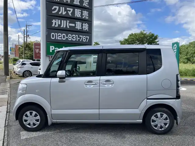 ホンダ Ｎ ＢＯＸ G Lパッケージ 広島県 2012(平24)年 4.1万km アラバスターシルバーメタリック 純正ディラーナビ（VXM-128VSX）/バックカメラ/ワンセグ/CD/DVD/AM/FM/純正フリップダウンモニター/左側パワースライドドア/シートカバー/スマートキー/スペアキー