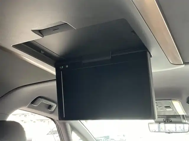 トヨタ アルファードハイブリット Z 東京都 2024(令6)年 1.4万km プラチナホワイトパールマイカ モデリスタフルエアロ〔REGAL DIGNITY STYLE〕/モデリスタシグネチャーイルミブレード/左右独立ムーンルーフ/ユニバーサルステップ/純正14型ディスプレイオーディオ/　・ナビ/フルセグTV/純正フリップダウンモニター/パノラミックビューモニター/アドバンストパーク/トヨタセーフティセンス/レーダークルーズコントロール/オートマチックハイビーム/クリアランスソナー/BSM/両側パワースライドドア/ワイヤレス充電/AC100V/ビルトインETC2.0/エグゼクティブパワーシート/シートヒーター/ベンチレーション/ステアリングヒーター/純正18インチAW〔ブラック塗装〕/3眼LEDヘッドライト/スマートキー/純正フロアマット/プッシュスタート/スマートキー