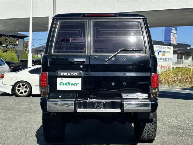 トヨタ ランドクルーザー プラド SX ワイド 熊本県 1995(平7)年 14.4万km 黒 2インチアップ車/NARDIステアリング/社外ナビ/【フルセグTV/CD/DVD/BT/SD】/バックカメラ/革調シートカバー/純正15インチAW/ETC/純正フロアマット