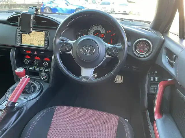 トヨタ ８６ GT 埼玉県 2015(平27)年 11.5万km ライトニングレッド /柿本マフラー//BLITZエアクリーナー//BLITZ車高調//DVDナビ//バックカメラ//ETC//スマートキーx2//キセノン//W.サイド.カーテンエアバッグ//ABS//横滑り防止装置//革巻きステアリング//Fフォグランプ//フロントスポイラー//リヤスポイラー//純正17インチAW//新車時保証書//取扱説明書