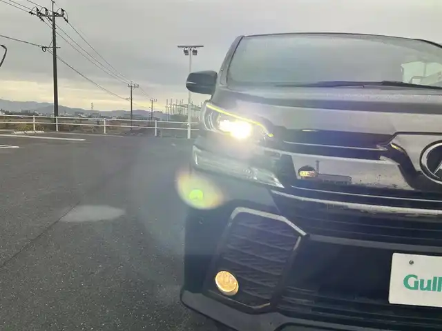 トヨタ ヴェルファイア Z Aエディション 佐賀県 2017(平29)年 6.2万km ブラック アルパイン11インチメモリーナビゲーション/・フルセグTV/CD/DVD/SD/Bluetooth/アルパイン12.8インチフリップダウンモニター/バックカメラ/前後ドライブレコーダー機能付デジタルインナーミラー/ビルトインETC/TVキャンセラー/両側パワースライドドア/100V電源/電子パーキングブレーキ/・AUTO HOLD機能/ハーフレザーシート/キャプテンシート/N席＋2列目オットマン/ISOFIX対応/革巻きステアリング/ステアリングリモコン/純正18インチアルミホイール/純正LEDヘッドライト/純正フォグランプ/純正フロアマット/純正ドアバイザ―/取扱説明書/クルーズコントロール/前後クリアランスソナー
