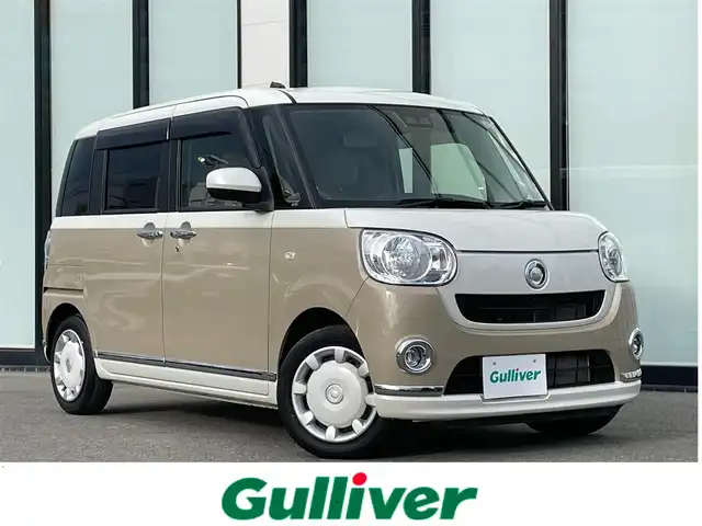 ダイハツ ムーヴ キャンバス 大阪府 2021(令3)年 2.2万km パールホワイトⅢ/ナチュラルベージュマイカメタリック 2トーン 社外ナビ　Stradaナビ/・Bluetooth/フルセグTV/CD/DVD/IPod/ラジオ/主要装備/・アラウンドビューモニター/・衝突軽減ブレーキ/・横滑り防止装置/・両側パワースライドドア/・ステアリングスイッチ/・ハロゲンヘッドライト/・オートマチックハイビーム/・ヘッドライトレベライザー/・フォグランプ/・純正ホイールキャップ/・純正フロアマット/・前後ドライブレコーダー/・ETC