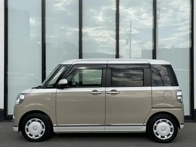 ダイハツ ムーヴ キャンバス 大阪府 2021(令3)年 2.2万km パールホワイトⅢ/ナチュラルベージュマイカメタリック 2トーン 社外ナビ　Stradaナビ/・Bluetooth/フルセグTV/CD/DVD/IPod/ラジオ/主要装備/・アラウンドビューモニター/・衝突軽減ブレーキ/・横滑り防止装置/・両側パワースライドドア/・ステアリングスイッチ/・ハロゲンヘッドライト/・オートマチックハイビーム/・ヘッドライトレベライザー/・フォグランプ/・純正ホイールキャップ/・純正フロアマット/・前後ドライブレコーダー/・ETC