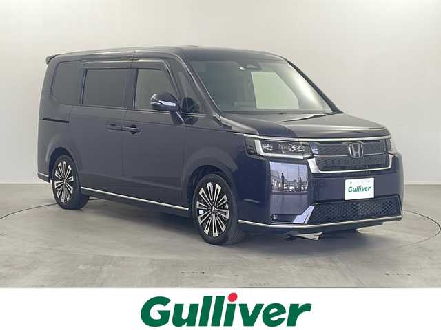 ホンダ ステップワゴン スパーダ eHEV プレミアムライン 栃木県 2022(令4)年 1.5万km トワイライトミストブラックパール 純正11.4インチナビ/（CD/DVD/BT/TV/AM・FM)/全方位カメラ/ホンダセンシング/・レーダークルーズコントロール/・レーンアシスト/・ブラインドスポットモニター/・パーキングセンサー/・衝突軽減ブレーキ/・標識認識機能/・オートマチックハイビーム/フリップダウンモニター/前席シートヒーター/電動リアゲート/両側パワースライドドア/オットマン/パドルシフト/電動格納ミラー/プッシュスタート/ETC