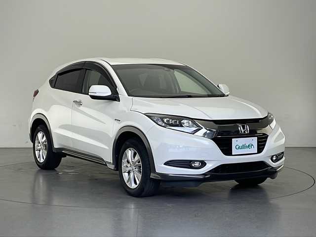 ホンダ ヴェゼル ハイブリッド X ホンダセンシング 長野県 2016(平28)年 2.9万km ホワイトオーキッドパール 4WD/純正SDナビ&フルセグTV&CD&DVD&USB&BT/ホンダセンシング/アダプティブクルーズコントロール/レーンキープアシスト/衝突軽減ブレーキ/オートマチックハイビーム/アイドリングストップ/前席シートヒーター/ステアリングスイッチ/パドルシフト/バックカメラ/ビルトインETC/LEDヘッドライト/オートライト/電動格納ミラー/ウィンカーミラー/電動ホールド/ブレーキホールド/純正16インチAW装着/純正フロアマット/プッシュスタート/スマートキー