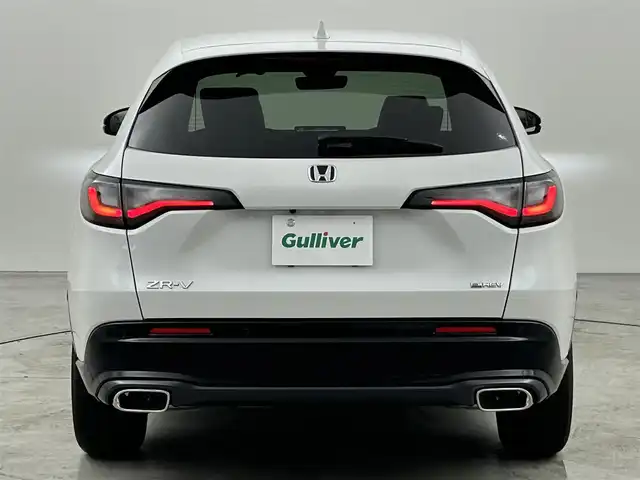 ホンダ ＺＲ－Ｖ ハイブリッド e:HEV Z ブラックスタイル 福岡県 2024(令6)年 0.1万km プラチナホワイトパール 純正９型ナビ　/全方位カメラ　/ＢＯＳＥサウンド　/ビルトインＥＴＣ２．０　/置くだけ充電　/アダプティブクルコン　/コーナーセンサー　/衝突被害軽減　/レーンキープ　/ＢＳＭ　/ヒルディセントコントロール　/パドルシフト　/パワーバックドア/シートヒーター/ステアリングヒーター/本革レザーシート/純正１８インチアルミホイール