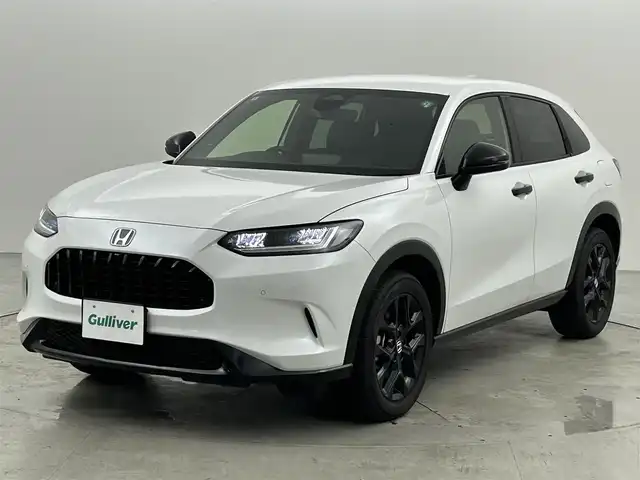 ホンダ ＺＲ－Ｖ ハイブリッド e:HEV Z ブラックスタイル 福岡県 2024(令6)年 0.1万km プラチナホワイトパール 純正９型ナビ　/全方位カメラ　/ＢＯＳＥサウンド　/ビルトインＥＴＣ２．０　/置くだけ充電　/アダプティブクルコン　/コーナーセンサー　/衝突被害軽減　/レーンキープ　/ＢＳＭ　/ヒルディセントコントロール　/パドルシフト　/パワーバックドア/シートヒーター/ステアリングヒーター/本革レザーシート/純正１８インチアルミホイール