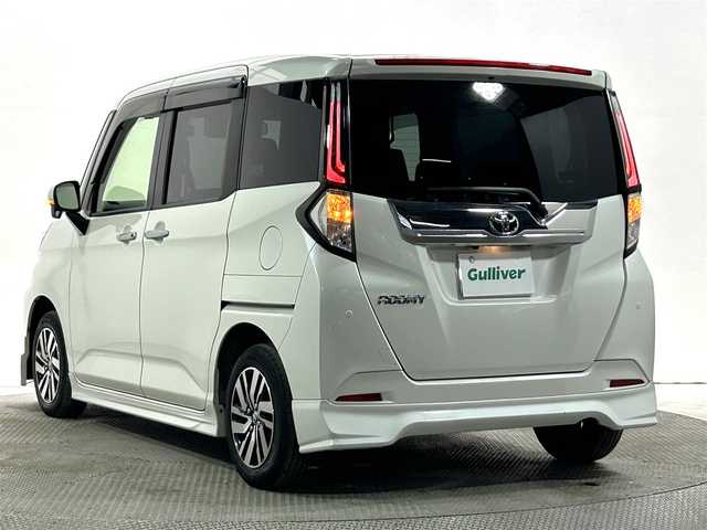 トヨタ ルーミー カスタムG 大阪府 2021(令3)年 3.9万km パールホワイトⅢ モデリスタエアロ　純正９ｉｎｃナビＴＶ　３６０カメラ　ＥＴＣ　両側パワースライドドア　衝突軽減　レーダーＣ　クリアランスソナー　シートヒーター　置くだけ充電　前後ドラレコ　ワンオーナー