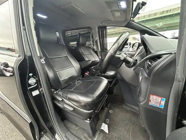 トヨタ ヴォクシー ZS 愛知県 2014(平26)年 10.3万km ブラック スマートキー/プッシュスタート/純正9インチナビ/フルセグTV/BT/バックカメラ/純正フリップダウンモニター/ビルトインETC/純正16インチAW/片側パワースライドドア/オートライト/純正フロアマット/純正ドアバイザー/取説、保証書