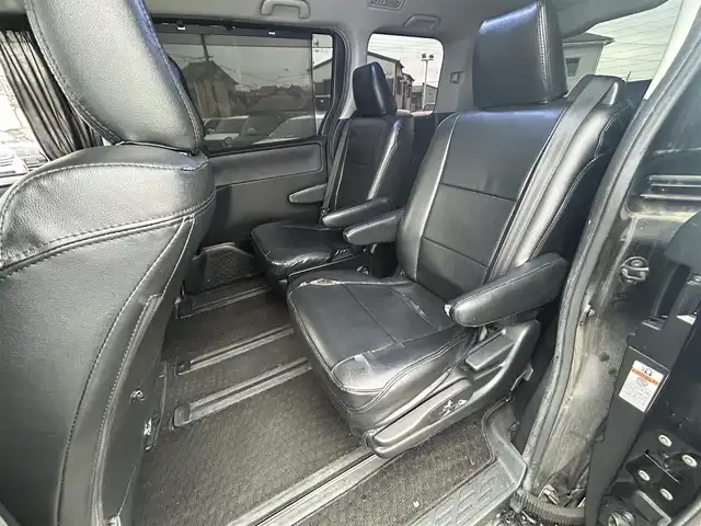 トヨタ ヴォクシー ZS 愛知県 2014(平26)年 10.3万km ブラック スマートキー/プッシュスタート/純正9インチナビ/フルセグTV/BT/バックカメラ/純正フリップダウンモニター/ビルトインETC/純正16インチAW/片側パワースライドドア/オートライト/純正フロアマット/純正ドアバイザー/取説、保証書