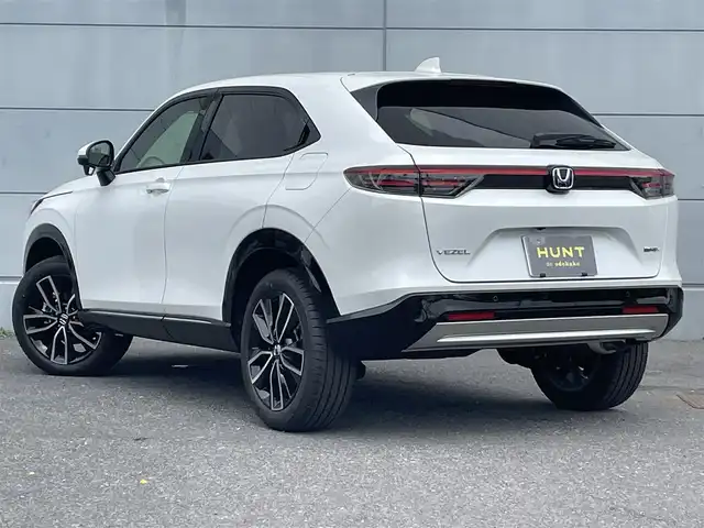 ホンダ ヴェゼル ハイブリッド e:HEV Z 千葉県 2025(令7)年 0.1千km プラチナホワイトパール 登録済未使用車/・登録時走行距離4km/ホンダセンシング/・衝突軽減ブレーキ/レーンキープアシスト/・レーダークルーズコントロール/オートハイビーム/・クリアランスソナー/ブラインドスポットモニター/純正9インチディスプレイナビ/・フルセグ/BT/USB/カープレイ/バックカメラ/ステアリングスイッチ/パドルシフト/ハンズフリーパワーバックドア/電動パーキングブレーキ/ブレーキホールド/ワイヤレス充電/ETC2.0/ハーフレザーシート/シートヒーター(D/N席)/LEDヘッドライト/オートライト/フォグライト/スマートキー/プッシュスタート