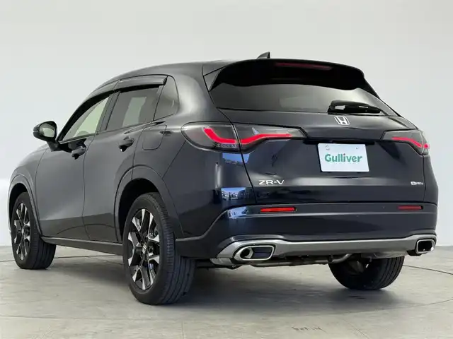 ホンダ ＺＲ－Ｖ ハイブリッド e:HEV Z 愛知県 2023(令5)年 0.4万km ミッドナイトブルービームM 純正9インチナビ/　・アラウンドビューモニター/　・フルセグTV/BOSEスピーカー/ワイヤレス充電器/ホンダセンシング/　・衝突軽減システム/　・クルーズコントロール/　・横滑り防止装置/　・コーナーセンサー/　・レーンキープアシスト/　・オートライト/　・オートマチックハイビーム/LEDヘッドライト/ダウンヒルアシストコントロール/電動リアゲート/パワーシート/シートメモリー/ステアリングヒーター/パドルシフト/ETC2.0/純正18AW/純正フロアマット/スマートキーHDDナビ