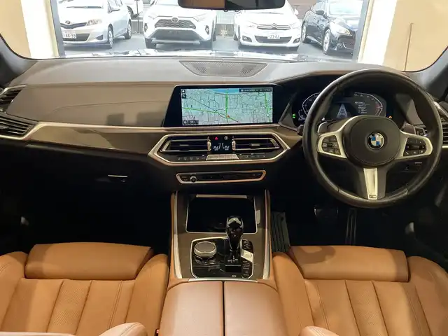 ＢＭＷ ＢＭＷ Ｘ５ xDrive 35d Mスポーツ 熊本県 2022(令4)年 2.3万km 黒 ・ワンオーナー/・プッシュスタート/・パノラマサンルーフ/・インテリジェントセーフティ/・注意喚起アシスタント/・ステアリングアシスト/・PDC自動起動/・アクティブPDC緊急ブレーキ/・パーキングアシスト/・ハイビームアシスト/・クルーズコントロール(追従式)/・茶革シート/・前席パワーシート/・全席シートヒーター/・純正メモリナビ/　【Bluetooth・USB・AppleCarPlay】/・フルセグTV/・全方位カメラ/・ETC/・ワイヤレス充電/・ドライブレコーダー(前後録画)/・パワーバックドア/・LEDヘッドランプ/・純正マット/・保証書/取説フリップダウンモニター