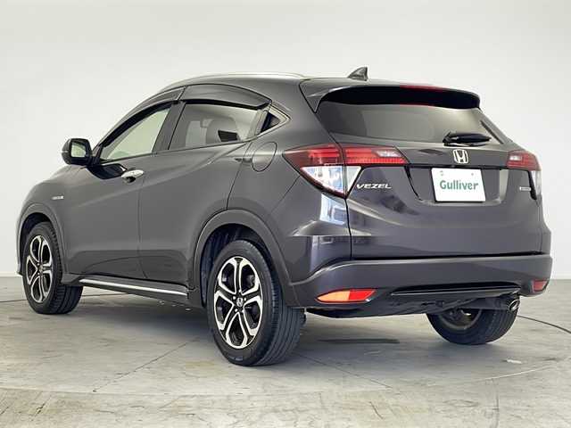 ホンダ ヴェゼル ハイブリッド Z ホンダセンシング 愛知県 2017(平29)年 5.7万km ルーセブラックM /禁煙車//純正ナビ(VXM-164VFi)//フルセグTV・AMFM・CD・DVD・SD・Bluetooth//バックカメラ//ETC//コンフォートビューパッケージ//ホンダセンシング//LEDヘッドライト//オートライト//フロントフォグランプ//ルーフレール//メッキフロントバンパーガーニッシュ//メッキフロントフォグガーニッシュ//チタン風マフラーカッター//専用インテリア(スエード調+ブラウンステッチ)//プライムスムース&スエード調コンビシート//前席シートヒーター//プラズマクラスター//電子パーキングブレーキ//ブレーキホールド//純正18インチアルミホイール//無限フロアマット//無限ドアバイザー//革巻きステアリング//ステアリングスイッチ//プッシュスタート//電動格納ミラー//アイドリングストップ//イモビライザー//新車保証書