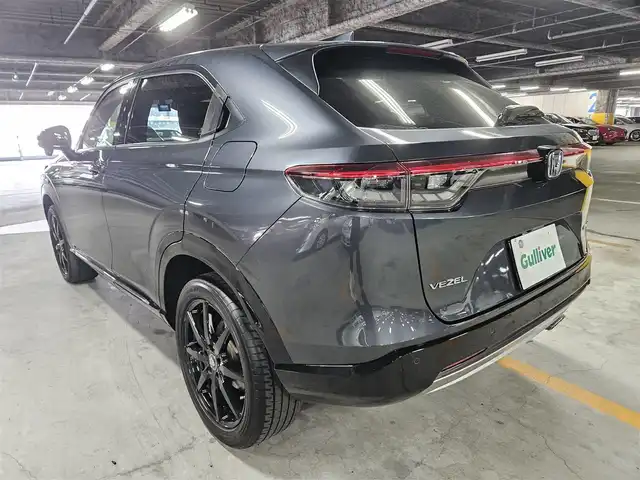 ホンダ ヴェゼル ハイブリッド e:HEV Z 島根県 2021(令3)年 9.7万km メテオロイドグレーメタリック 4WD/純正MOP9型ナビ/フルセグTV/ハンズフリーパワーバックドア/バックカメラ/ビルトインETC2.0/前後ドライブレコーダー/アダプティブクルーズコントロール/前後パーキングセンサー/ホンダセンシング/・衝突被害軽減ブレーキ/・車線逸脱防止支援システム/・前後誤発進抑制機能/・オートハイビーム/ブラインドスポットインフォメーション/フルLEDヘッドランプ/革巻きステアリング/パドルシフト/ハーフレザーシート/前席シートヒーター/社外18インチアルミホイール/スマートキー/プッシュエンジンスタート/禁煙車