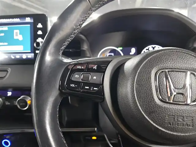 ホンダ ヴェゼル ハイブリッド e:HEV Z 島根県 2021(令3)年 9.7万km メテオロイドグレーメタリック 4WD/純正MOP9型ナビ/フルセグTV/ハンズフリーパワーバックドア/バックカメラ/ビルトインETC2.0/前後ドライブレコーダー/アダプティブクルーズコントロール/前後パーキングセンサー/ホンダセンシング/・衝突被害軽減ブレーキ/・車線逸脱防止支援システム/・前後誤発進抑制機能/・オートハイビーム/ブラインドスポットインフォメーション/フルLEDヘッドランプ/革巻きステアリング/パドルシフト/ハーフレザーシート/前席シートヒーター/社外18インチアルミホイール/スマートキー/プッシュエンジンスタート/禁煙車