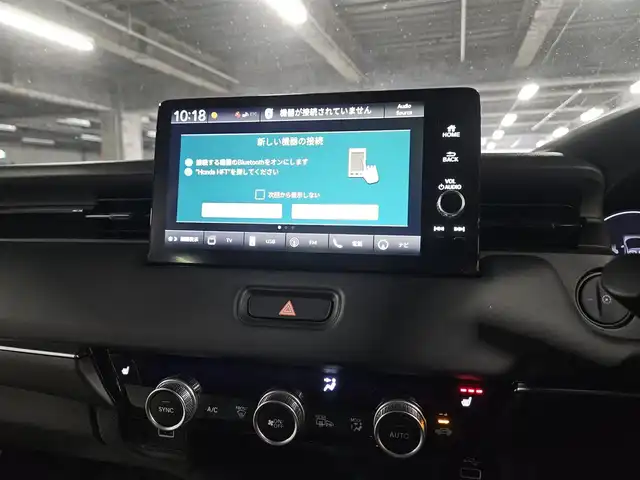 ホンダ ヴェゼル ハイブリッド e:HEV Z 島根県 2021(令3)年 9.7万km メテオロイドグレーメタリック 4WD/純正MOP9型ナビ/フルセグTV/ハンズフリーパワーバックドア/バックカメラ/ビルトインETC2.0/前後ドライブレコーダー/アダプティブクルーズコントロール/前後パーキングセンサー/ホンダセンシング/・衝突被害軽減ブレーキ/・車線逸脱防止支援システム/・前後誤発進抑制機能/・オートハイビーム/ブラインドスポットインフォメーション/フルLEDヘッドランプ/革巻きステアリング/パドルシフト/ハーフレザーシート/前席シートヒーター/社外18インチアルミホイール/スマートキー/プッシュエンジンスタート/禁煙車