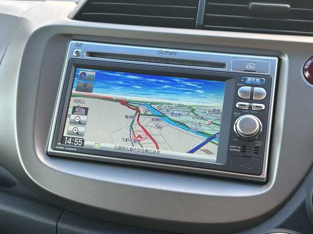 ホンダ フィット ハイブリット 10thアニバーサリー 広島県 2012(平24)年 5.3万km プレミアムホワイトパール 禁煙/純正ナビ（VXM-128VS）/・ワンセグ/CD/DVD/SD/USB/クルーズコントロール/電動格納ウィンカーミラー/HIDパッケージ/・ディスチャージヘッドライト〈HID〉/・シルバー塗装インナードアハンドル/・ブラック塗装フロントピラーガーニッシュ/ドアバイザー/純正フロアマット/スマートキー/社外アルミホイール