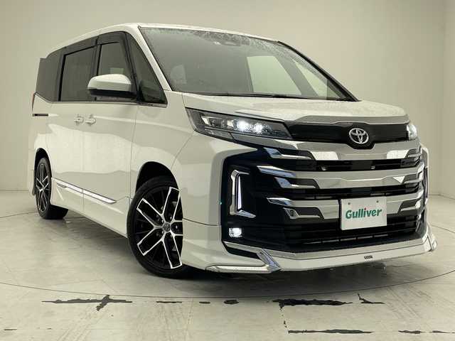 トヨタ ノア S－Z 沖縄県 2022(令4)年 2.9万km ホワイトパールクリスタルシャイン 純正１０．５型ナビ/（フルセグＴＶ　Ｂｌｕｅｔｏｏｔｈ　DVD　HDMI）/フリップダウンモニター/バックカメラ/ＥＴＣ2.0　/両側パワースライドドア/前後ドライブレコーダー/クルーズコントロール/トヨタセーフティセンス/コーナーセンサー/モデリスタエアロ/ENKEI製アルミホイール/シートヒーター/プッシュスタート/スマートキー/スペアキー