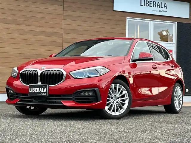 ＢＭＷ １１８ｉ プレイ 宮崎県 2020(令2)年 3万km 赤 純正ナビゲーション/・Bluetooth/・AM/FM/・USB/・ミラーリンク/キーレスエントリー/・プッシュスタート/インテリジェントセーフティ/バックカメラ/パワーバックドア/ワイヤレスチャージ/D席パワーシート/アンビエントライト/アダプティブクルーズコントロール/前後ドライブレコーダー/ETC/オートライト/キープレーンアシスト