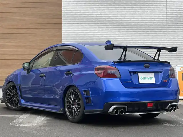 スバル ＷＲＸ ＳＴＩ STI 秋田県 2014(平26)年 4.1万km WRブルーパール 6速MT/４WD/ターボ/STI製ドライカーボンリヤスポイラー/STI製アルミホイール/フルエアロ/ローダウン（TEIN製）/純正サスペンション積込/スマートキー/ETC/プッシュスタート/純正フロアマット/純正ドアバイザー/パワーステアリング/パワーウィンドウ/オートエアコン/オートライト/電動格納ウィンカーミラー/保証書/取扱説明書/記録簿