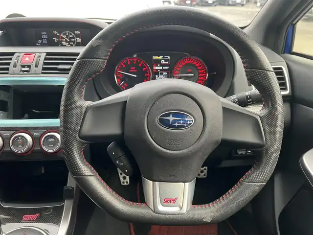 スバル ＷＲＸ ＳＴＩ STI 秋田県 2014(平26)年 4.1万km WRブルーパール 6速MT/４WD/ターボ/STI製ドライカーボンリヤスポイラー/STI製アルミホイール/フルエアロ/ローダウン（TEIN製）/純正サスペンション積込/スマートキー/ETC/プッシュスタート/純正フロアマット/純正ドアバイザー/パワーステアリング/パワーウィンドウ/オートエアコン/オートライト/電動格納ウィンカーミラー/保証書/取扱説明書/記録簿