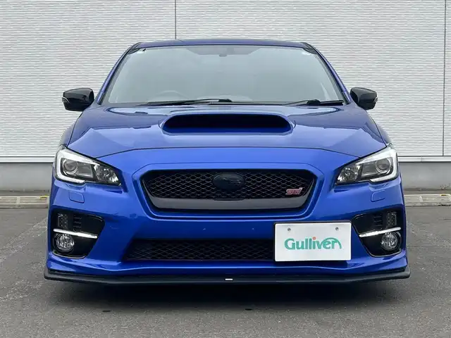スバル ＷＲＸ ＳＴＩ STI 秋田県 2014(平26)年 4.1万km WRブルーパール 6速MT/４WD/ターボ/STI製ドライカーボンリヤスポイラー/STI製アルミホイール/フルエアロ/ローダウン（TEIN製）/純正サスペンション積込/スマートキー/ETC/プッシュスタート/純正フロアマット/純正ドアバイザー/パワーステアリング/パワーウィンドウ/オートエアコン/オートライト/電動格納ウィンカーミラー/保証書/取扱説明書/記録簿